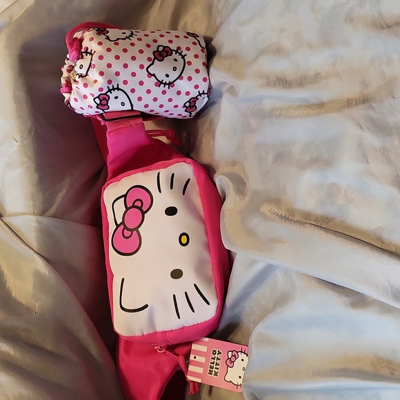 Sanrio Handbags - Hello Kitty travel pack w bottle holder